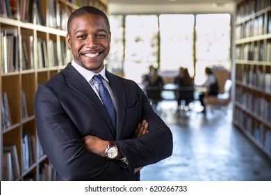 Cheerful Happy Confident African American Business Man Attorney Legal Representative With Arms Crossed 