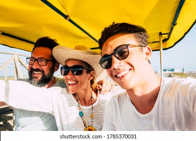 Cheerful Happy Family Have Fun Together In Outdoor Leisure Activity Laughing And Smiling - Concep Tof Summer Holiday Vacation For Adult And Teenager People - Selfie Style Picture For Social Media