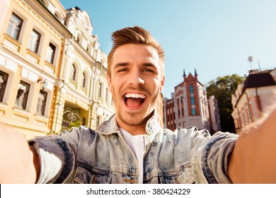 Cheerful Happy Man Making Selfie Photo On The Street