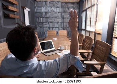 Cheerful Happy Man Throwing A Paper Ball