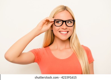 Cheerful Happy Smiling Blonde In Red Shirt And Glasses