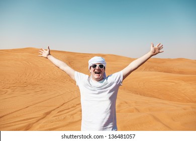 Cheerful happy tourist guy in Safari Desert - Powered by Shutterstock