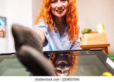 The Cheerful Housewife Reaches Out To Take The Tasty Pie Out Of The Oven With A Big Smile On Her Face.