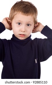 Cheerful Kid Grimaces, Pulls His Ears