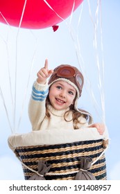 Cheerful Kid On Hot Air Balloon In The Sky