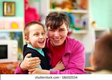 cheerful kids with disabilities in rehabilitation center - Shutterstock ID 186310154