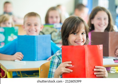 Cheerful Kids Learning In School Classroom