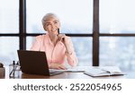 Cheerful Lady At Laptop Dreaming About Successful Business Career Working Sitting At Workplace In Modern Office. Free Space