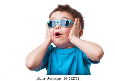 Cheerful little boy in sunglasses express surprised face, isolated on white background - Shutterstock ID 364882781