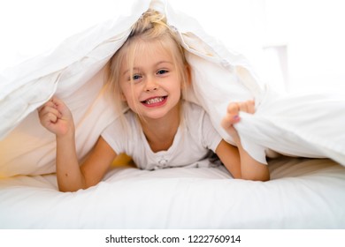 Cheerful Little Girl Bed Having Fun Stock Photo (Edit Now) 1222760914