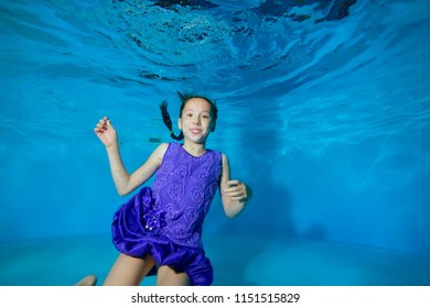 Cheerful Little Girl Purple Dress Swimming Stock Photo 1151515829 ...