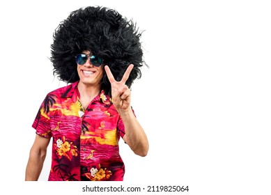 Cheerful Male In Afro Wig Gesturing V Sign