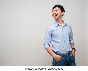 Cheerful Man Blue Shirt Happy Smile Turn Around To Looking At Copy Space