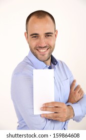 Cheerful Man With Blue Shirt Holding Booklet