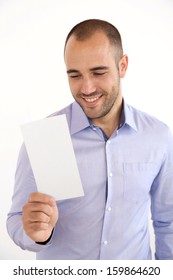 Cheerful Man With Blue Shirt Holding Booklet