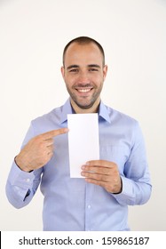 Cheerful Man With Blue Shirt Holding Booklet