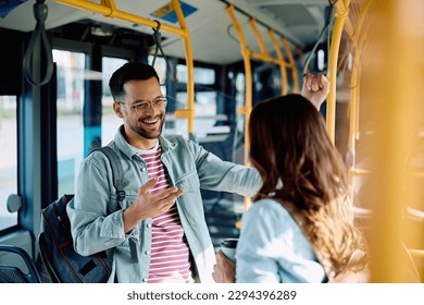 Cheerful man having fun his female friend while riding in a bus.  - Powered by Shutterstock