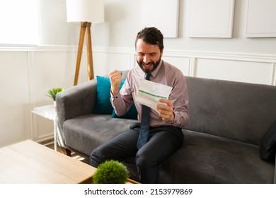 Cheerful Man Paying All His Bills And Feeling Financially Stable. Wealthy Man With A Lot Of Money Celebrating 