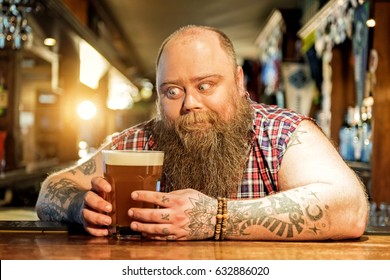 Cheerful man wanting to taste ale