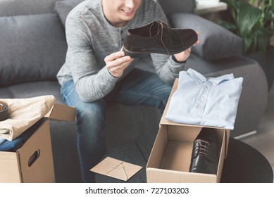 Cheerful Man Watching New Shoes Stock Photo 727103203 | Shutterstock