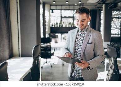 A Cheerful Manager Starting His Working Day - Shutterstock ID 1557159284