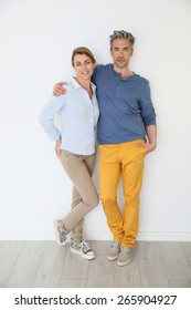 Cheerful Mature Couple On White Background