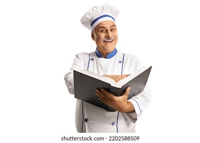 Cheerful Mature Male Chef Smiling And Holding A Cook Book Isolated On White Background