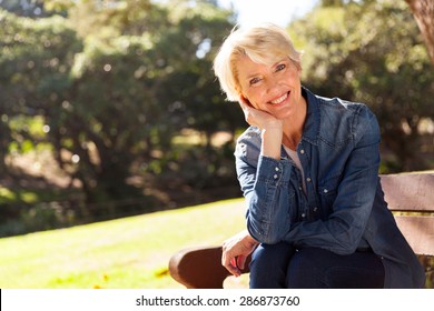 Cheerful Mid Age Woman Looking At The Camera