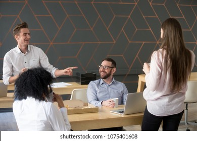 Cheerful Millennial Team People Chatting And Laughing Eating Pizza Together, Friendly Diverse Colleagues Group Talking Discussing Funny Joke Having Fun During Lunch Or Coffee Break In Office Room