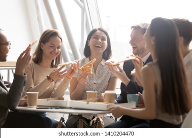 Cheerful Multicultural Team Business People Workers Laugh Share Lunch Meal Eating Pizza Together At Work, Friendly Diverse Coworkers Group Talking Having Fun At Corporate Party Funny Office Meeting