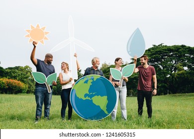 Cheerful people with energy conservation icons - Powered by Shutterstock