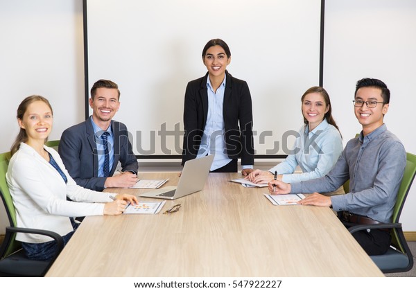 Cheerful People Looking Camera Board Room Stock Photo Edit