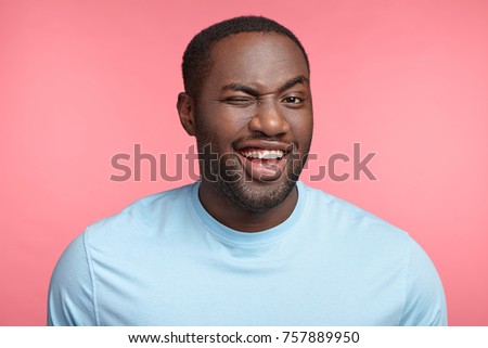 Similar – Image, Stock Photo adult man in black clothes stands upright with strained muscles