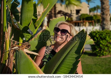 Similar – Image, Stock Photo Woman’s head over plant