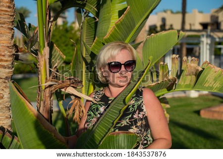 Similar – Image, Stock Photo Woman’s head over plant