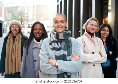 Cheerful Portrait Of A Group Of Female Business Looking At The Camera. Only Woman Workers. Group Of Women Smiling With Self-confidence. Feminist Empowerment And Gender Equality