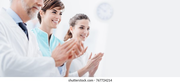 Cheerful Professional Medical Team Attending A Presentation And Clapping Hands, Teamwork And Success Concept