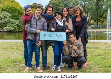 Cheerful Queer Group Holding A Message Supporting The LGBT Community