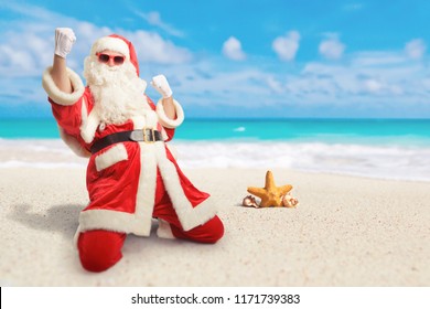 Cheerful Santa Claus Is Happy  About His Perfect Sunny Vacation Destination At The Beach.