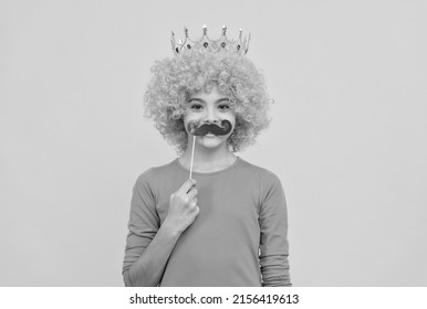 Cheerful Selfish Child Girl In Curly Wig And Princess Diadem Wear Party Moustache, Party