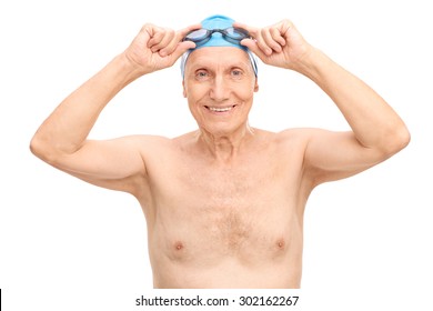 Cheerful senior with a blue swim cap putting on his swimming goggles and looking at the camera isolated on white background - Powered by Shutterstock