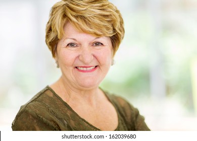 Cheerful Senior Woman Closeup Portrait At Home