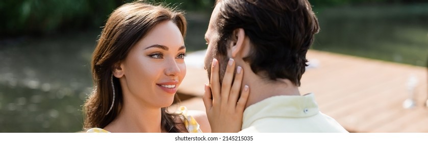 Cheerful And Sensual Woman Touching Face Of Boyfriend, Banner