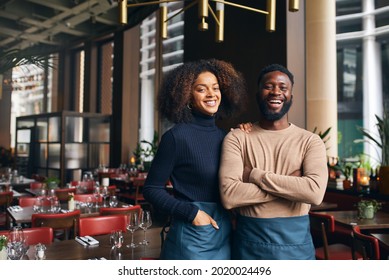 Cheerful Small Business Partners In Restaurant