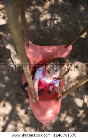 Similar – Image, Stock Photo Little girl climbing to a wooden observation tower in a wetland