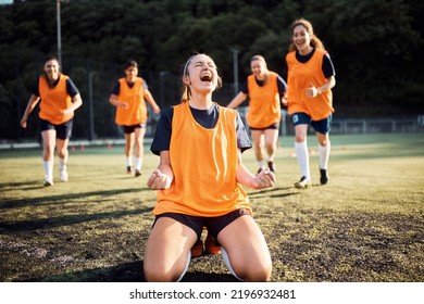 Cheerful soccer player shouting while celebrating her team's victory. - Powered by Shutterstock