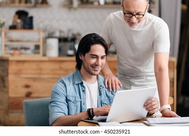 Cheerful Son And Dad