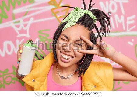 Similar – Image, Stock Photo Street of Peace is the name of the street sign on the wall. A part of a window is still visible.