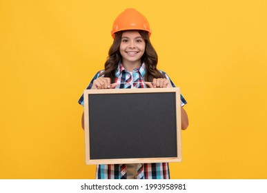 Cheerful Teen Girl Laborer Hold Blackboard. Child Advertising Labor Day. Back To School.