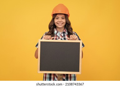 Cheerful Teen Girl Laborer Hold Blackboard. Child Advertising Labor Day. Back To School.